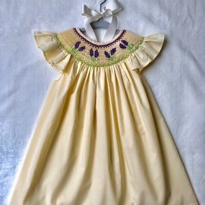 SOLD Beautiful smocked wild flowers yellow dress